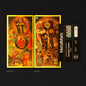 A pair of decorative Metalwalk collectible cards shown front and back on a black background, alongside a black side label. The cards feature intricate gold, orange, red, and green illustrated artwork with mechanical and abstract designs.